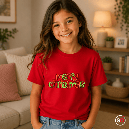 Kinder T-Shirt mit fröhlichem 'Merry Christmas' Schriftzug im Comic-Stil - StyleOne