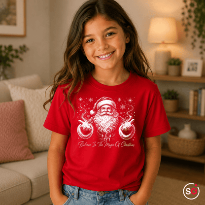 Kinder T-Shirt mit magischem Weihnachtsmann & Spruch 'Believe In The Magic Of Christmas' - StyleOne
