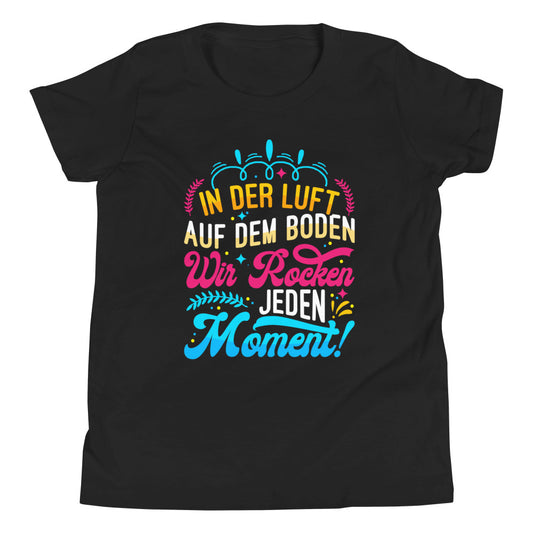 In der Luft, auf dem Boden, wir rocken den Moment Cheerleading - Dein einzigartiges T-Shirt